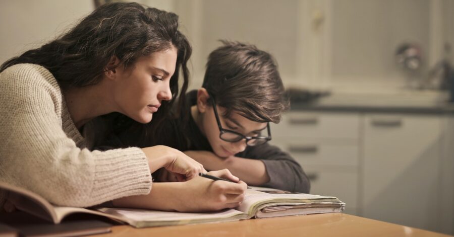 Mother and son studying maths